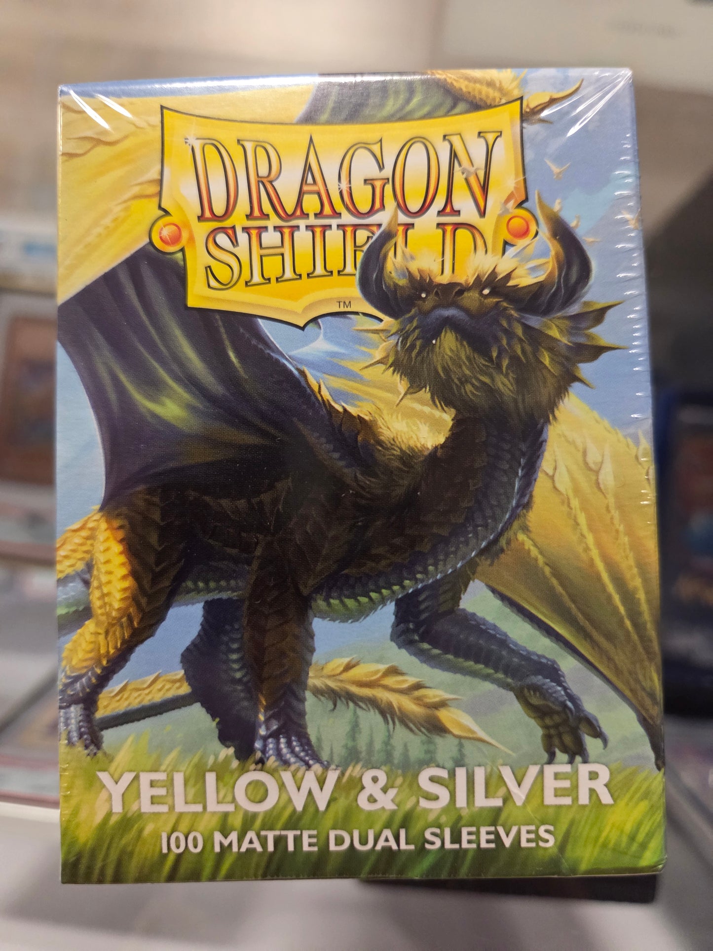 Dragon Shield 100 Card Sleeves. Color Yellow & Silver