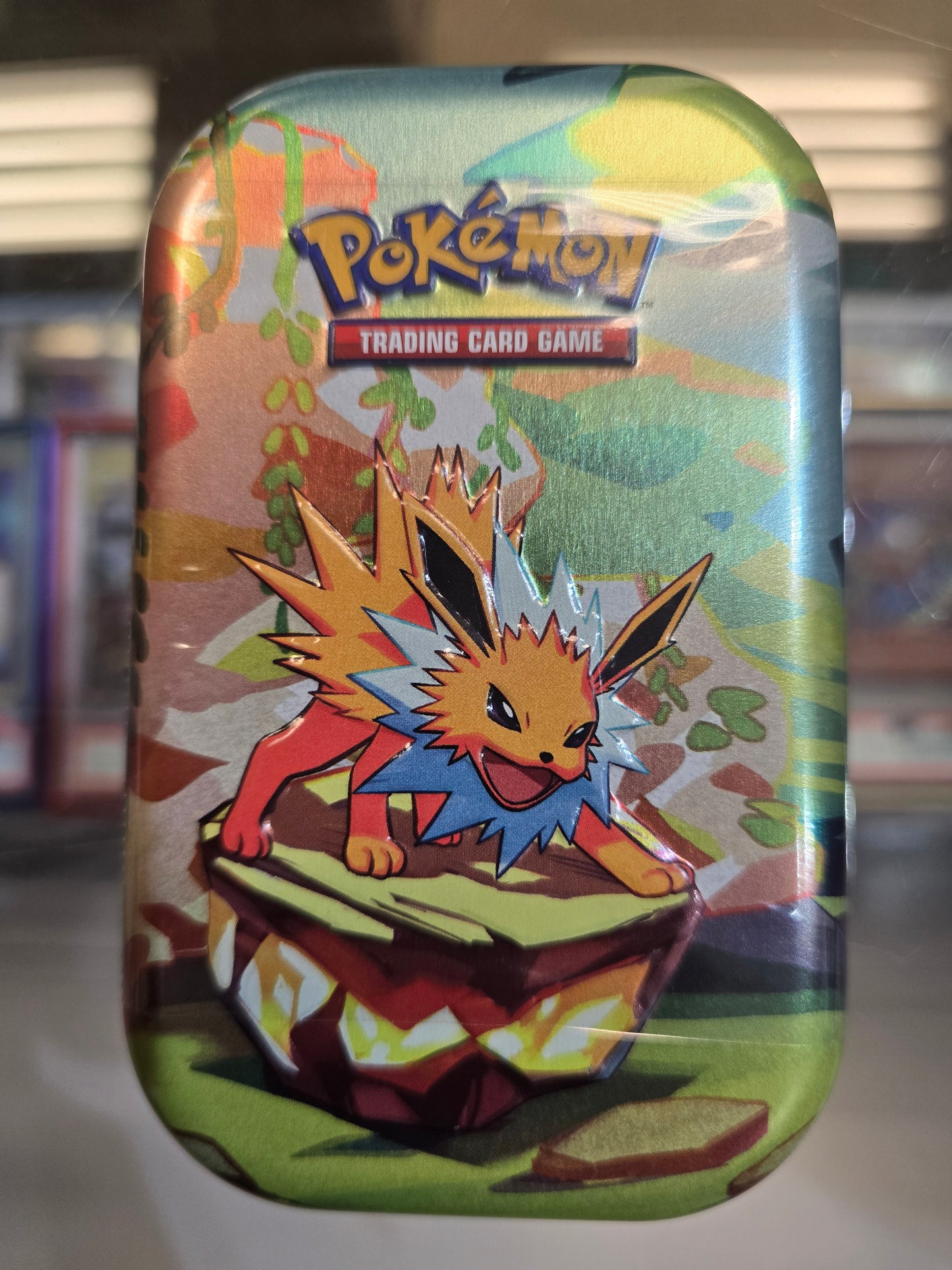 Prismatic Evolution Mini Tin