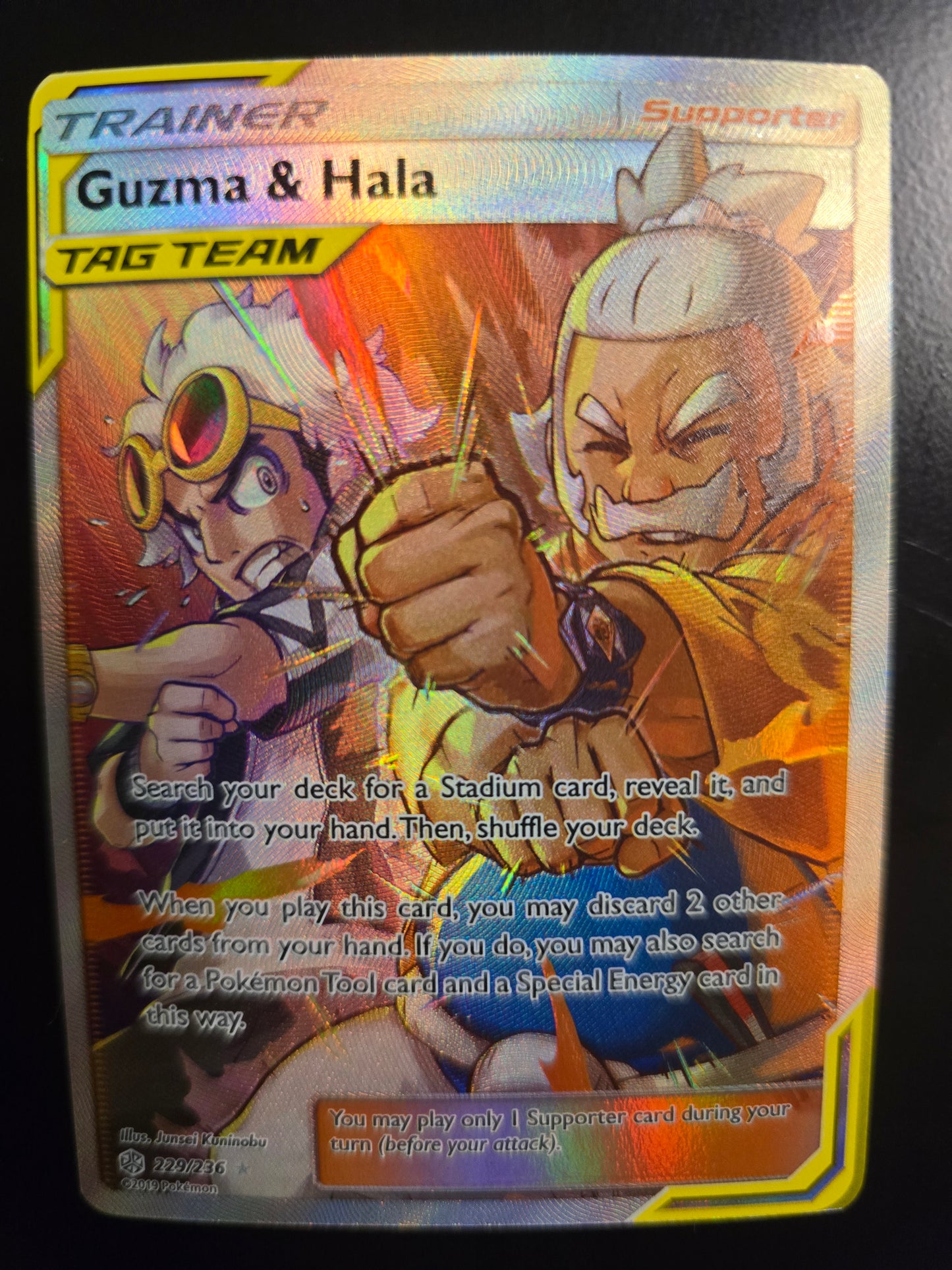 Tag Team Guzma & Hala 229/236 SM Cosmic Eclipse Full Art Holofoil NM