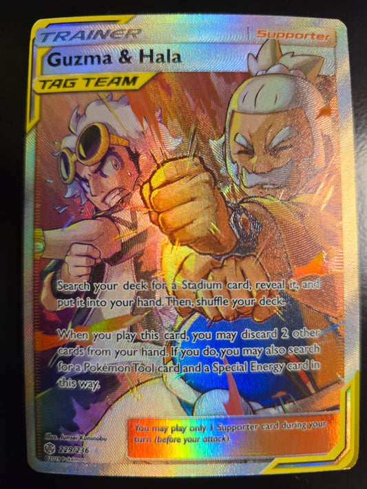 Tag Team Guzma & Hala 229/236 SM Cosmic Eclipse Full Art Holofoil NM