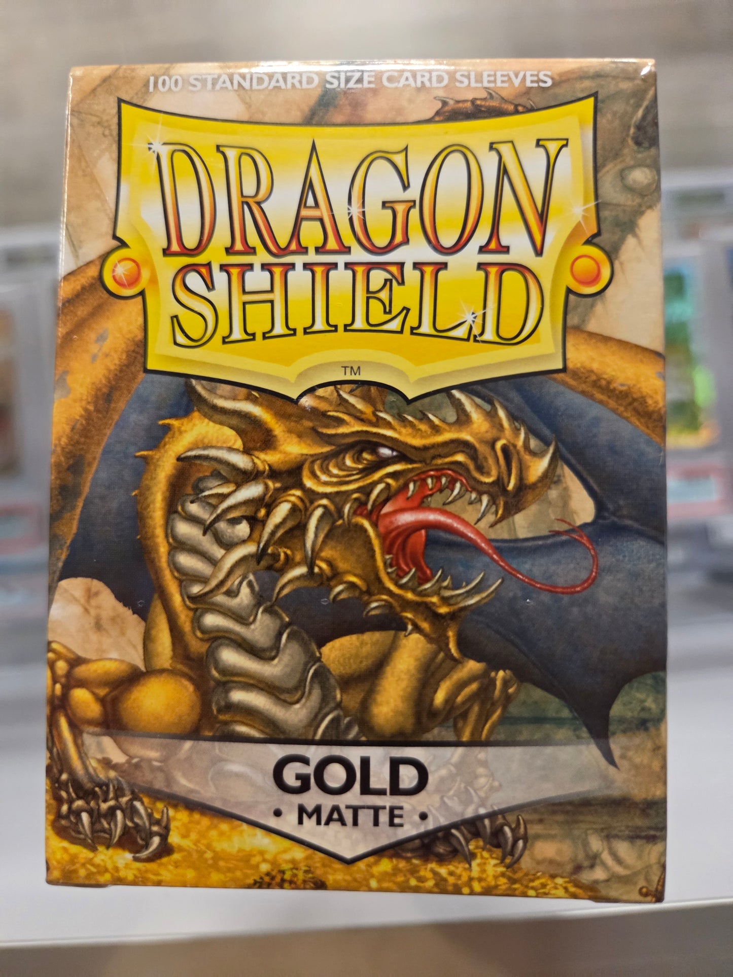 Dragon Shield 100 Card Sleeves. Color Gold